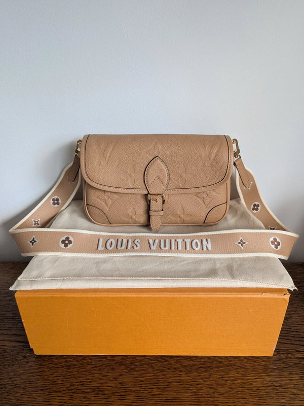 Louis Vuitton Diane Empreinte Leather In Beige / Sand